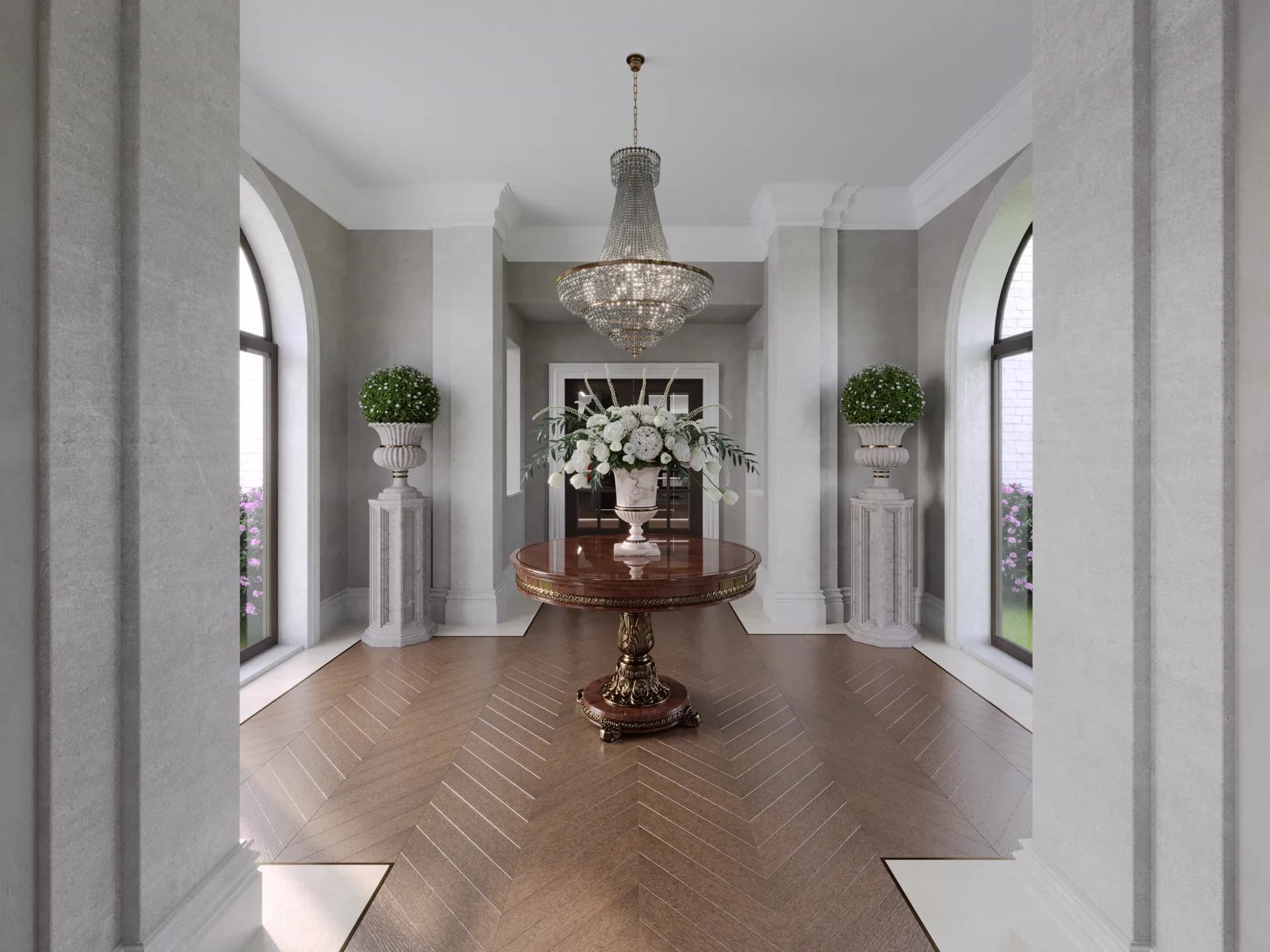 Entrance hall with a round table, flower arrangement and chandelier — Windsor Estate, Windsor