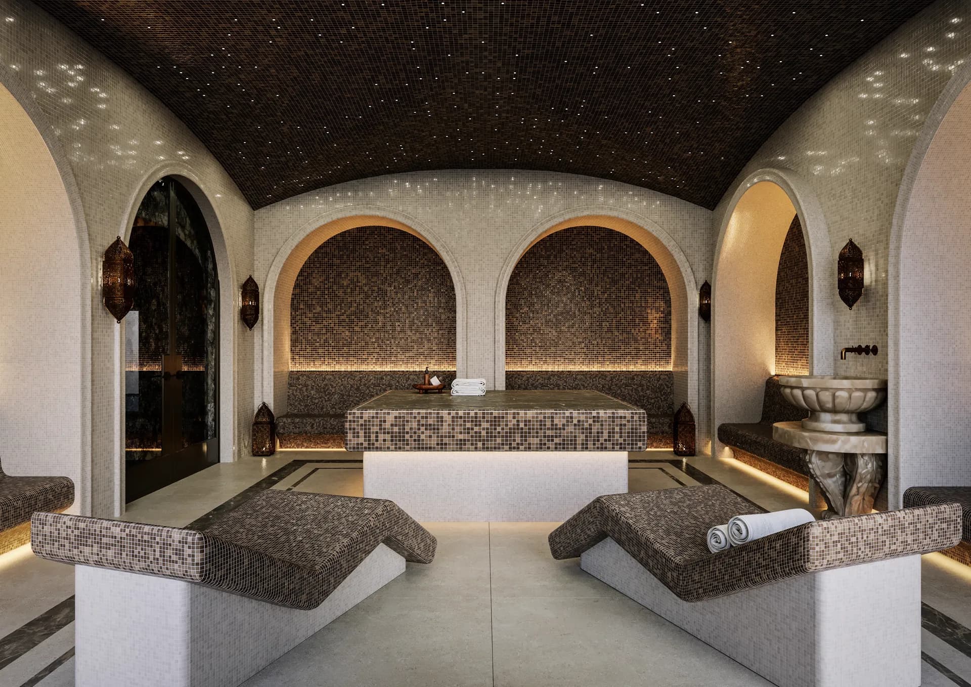Hammam with a mosaic massage table, arched niches and a star ceiling — Windsor Estate, Windsor